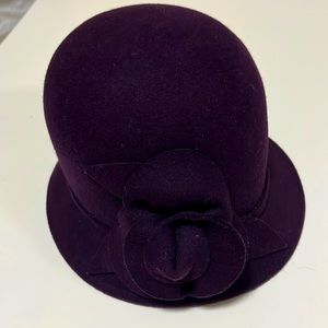Nice plum hat. Barely used